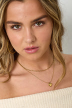 Layered necklace with heart charm