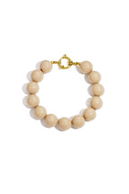 Bracelet with large beads and clasp at the front