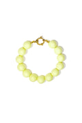 Bracelet with large beads and clasp at the front