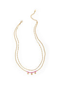 Layered necklaces with beads and hearts