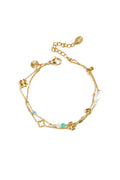 Bracelet with clover, beads and stones